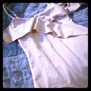 Nude bodysuit. Off the shoulder ruffles.